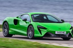 2025 McLaren Artura by a body of water.